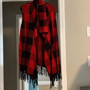 Red buffalo check sweater vest with fringe detail